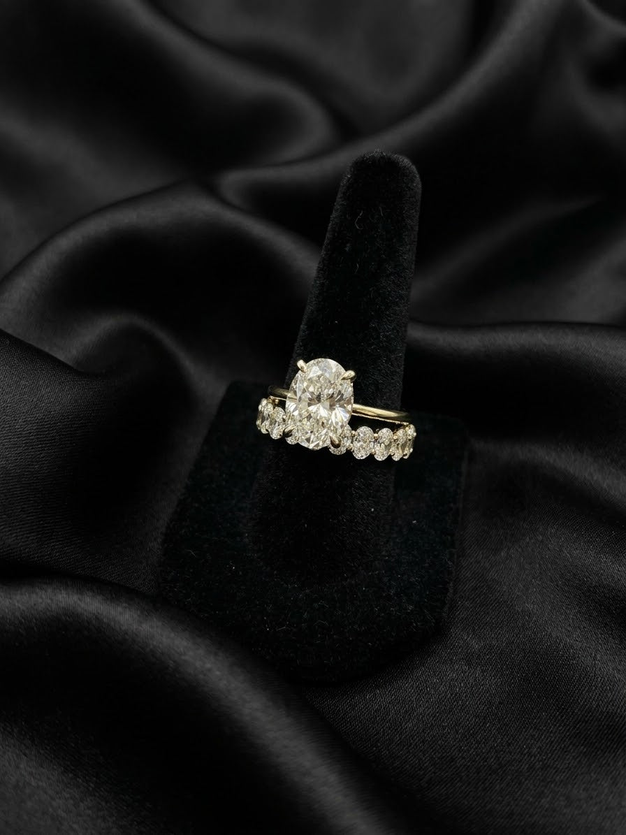 4 carat diamond ring with 2 carat oval eternity ring