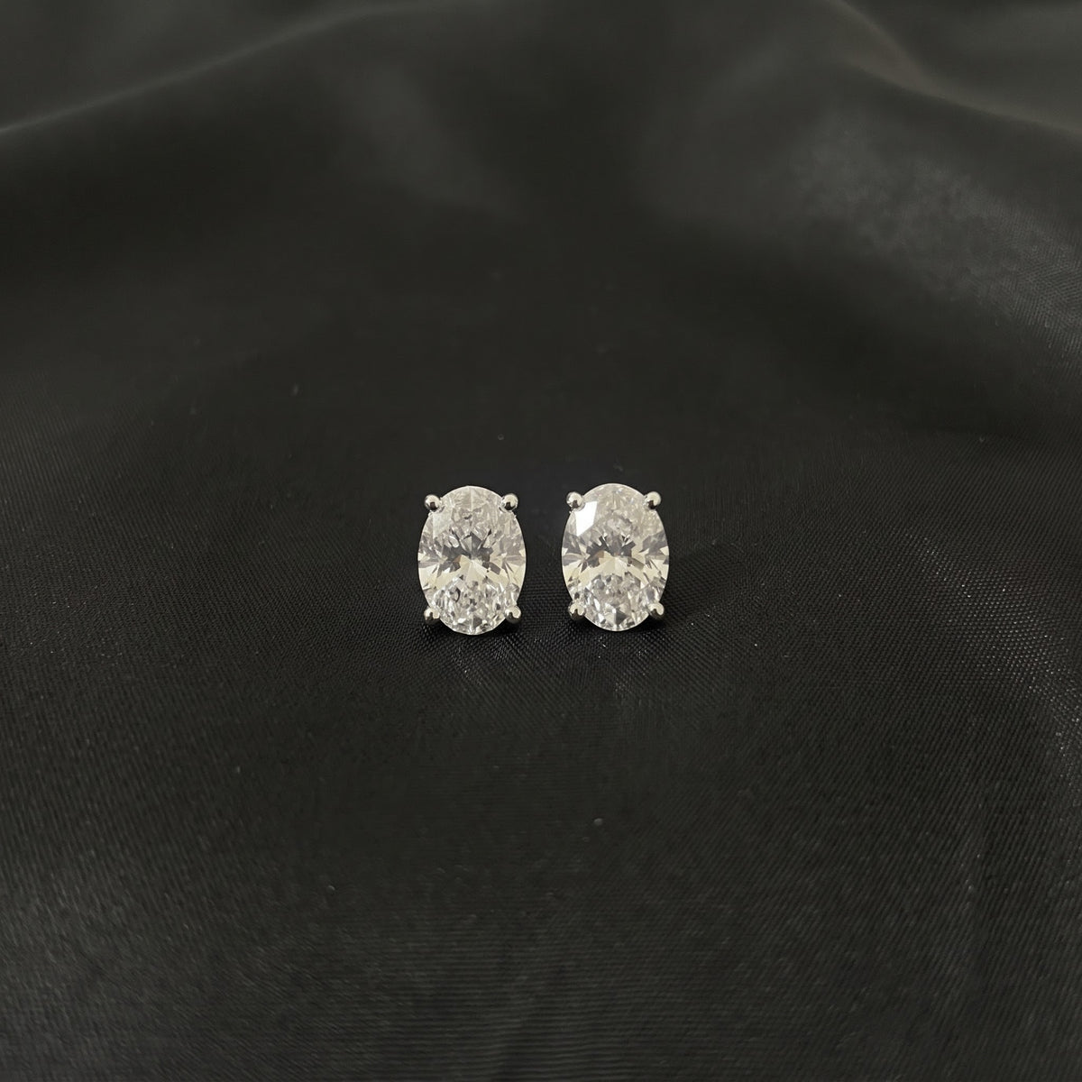 5 carat total weight lab-grown diamond studs set in 14k white gold
