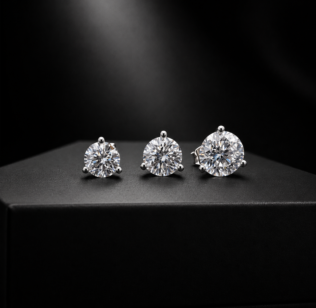 .5, 1, 1.5 carat diamond stud earrings